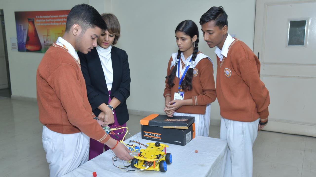 Students showing their science project